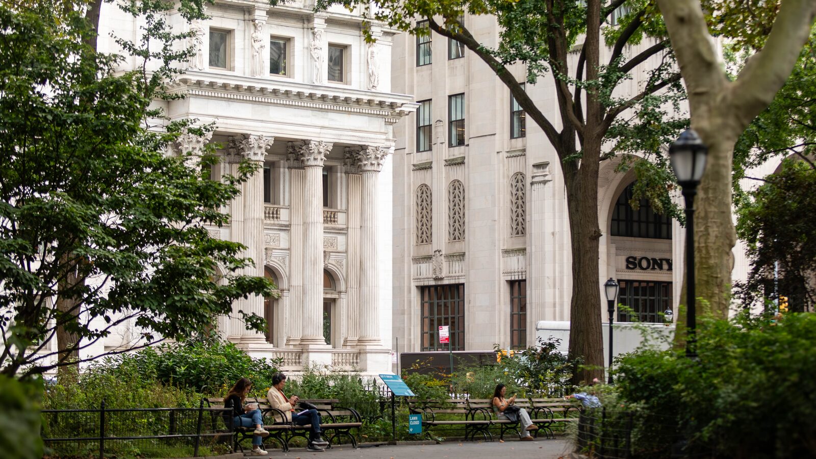 Rendering of Madison Square Park near 95 Madison, with mature trees, open lawns, and surrounding NoMad architecture.